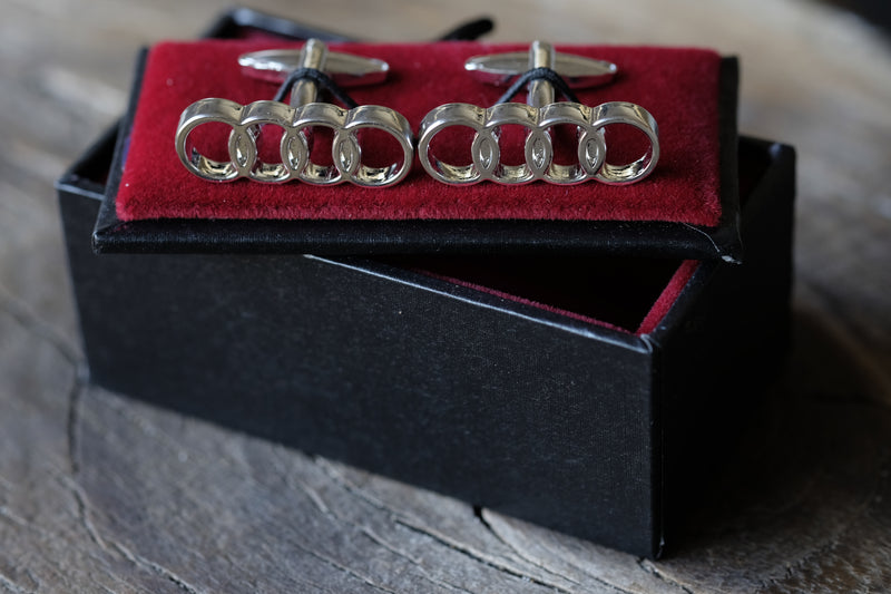 Gemelos hombre - Logo Audi