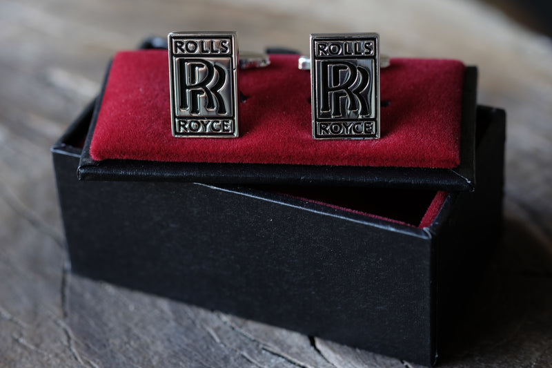 Gemelos hombre - Logo Rolls Royce